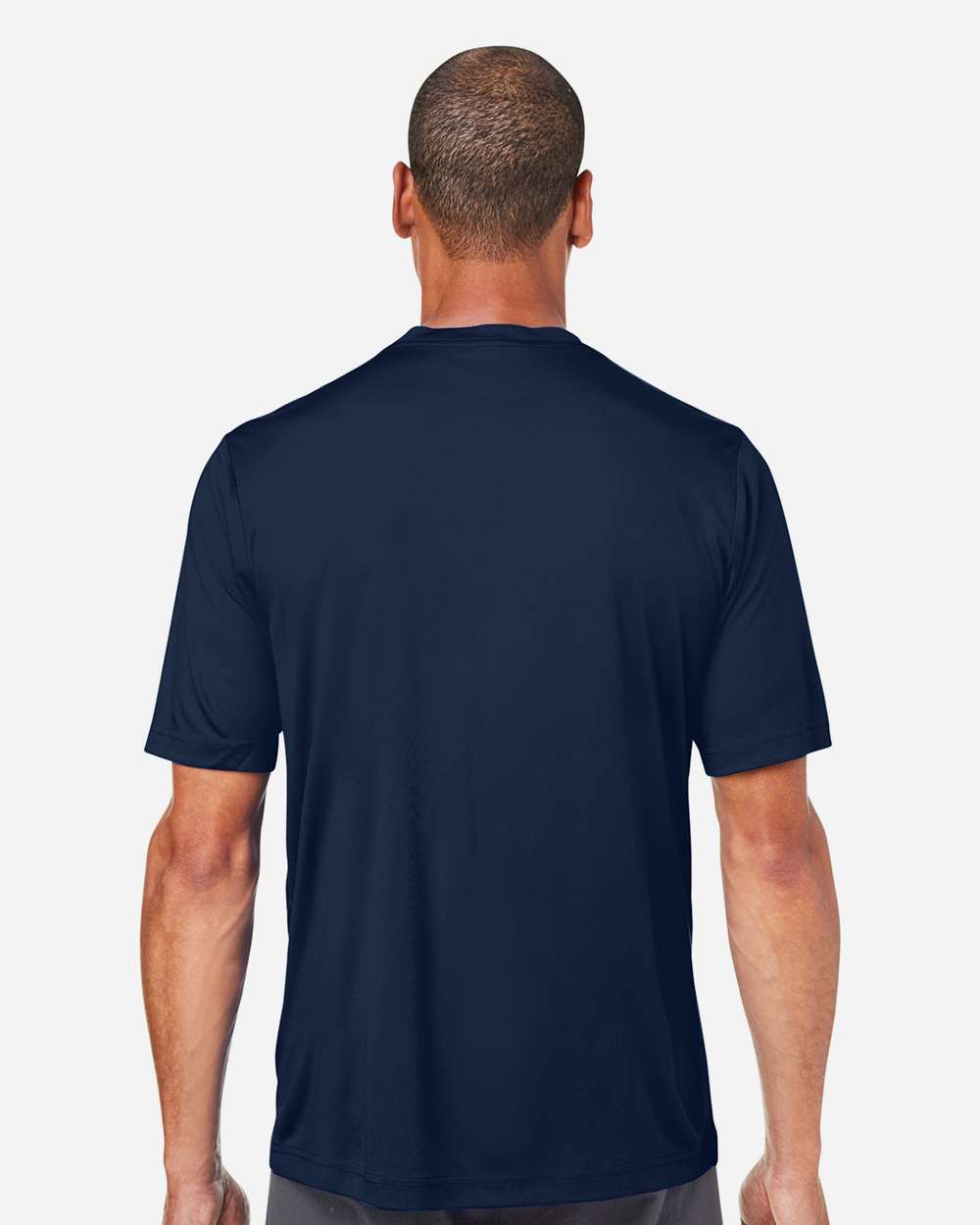 Navy performance tee on model, back — Big Sioux Swag team apparel