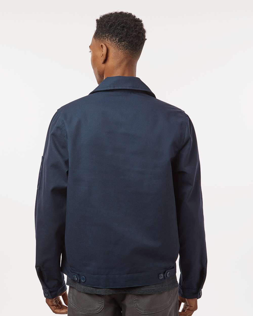 Navy work jacket on model, back — Big Sioux Swag branded workwear